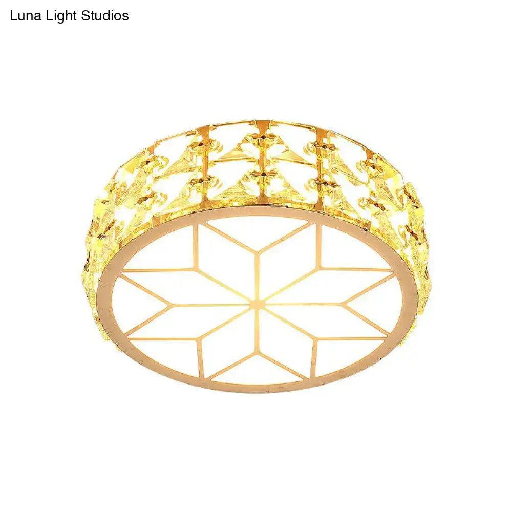 Gold-toned flush mount ceiling light with geometric crystal design and ornate faceted embellishments for passageway use