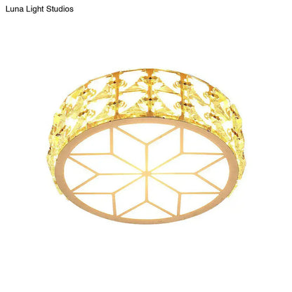 Gold-toned flush mount ceiling light with geometric crystal design and ornate faceted embellishments for passageway use