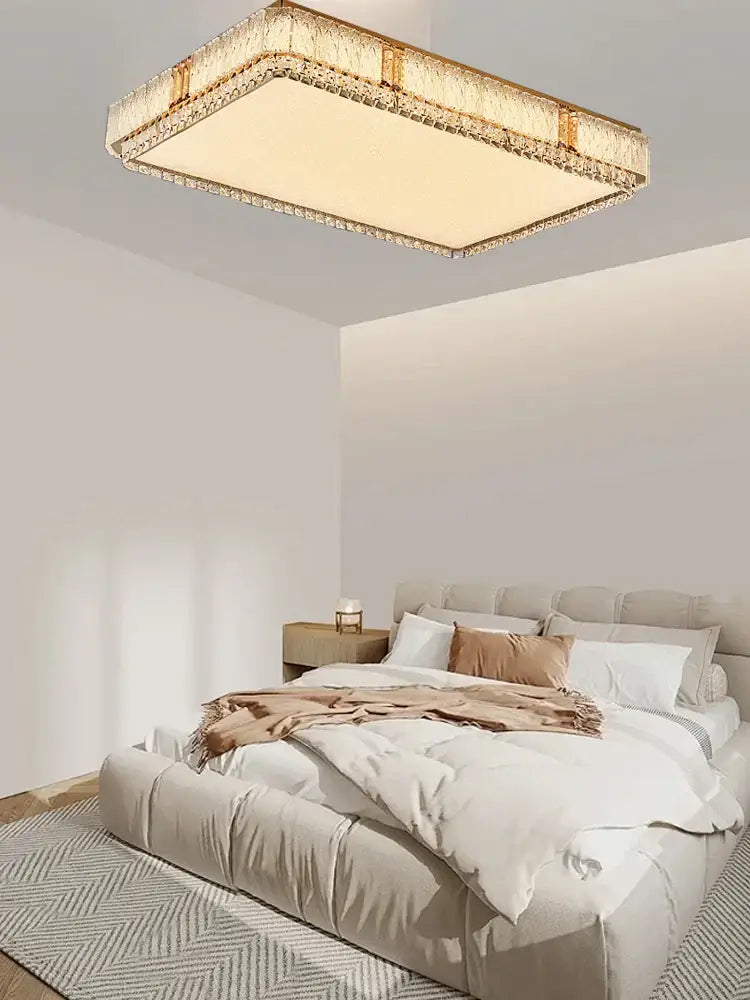Modern gold crystal glass ceiling light fixture with warm glow and sparkling crystal glass ceiling accents for living room decor