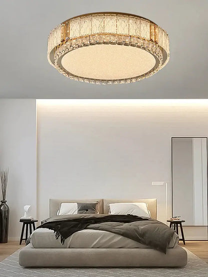 Modern gold crystal glass ceiling light fixture featuring a circular gold-toned metal frame with decorbites crystal glass accents