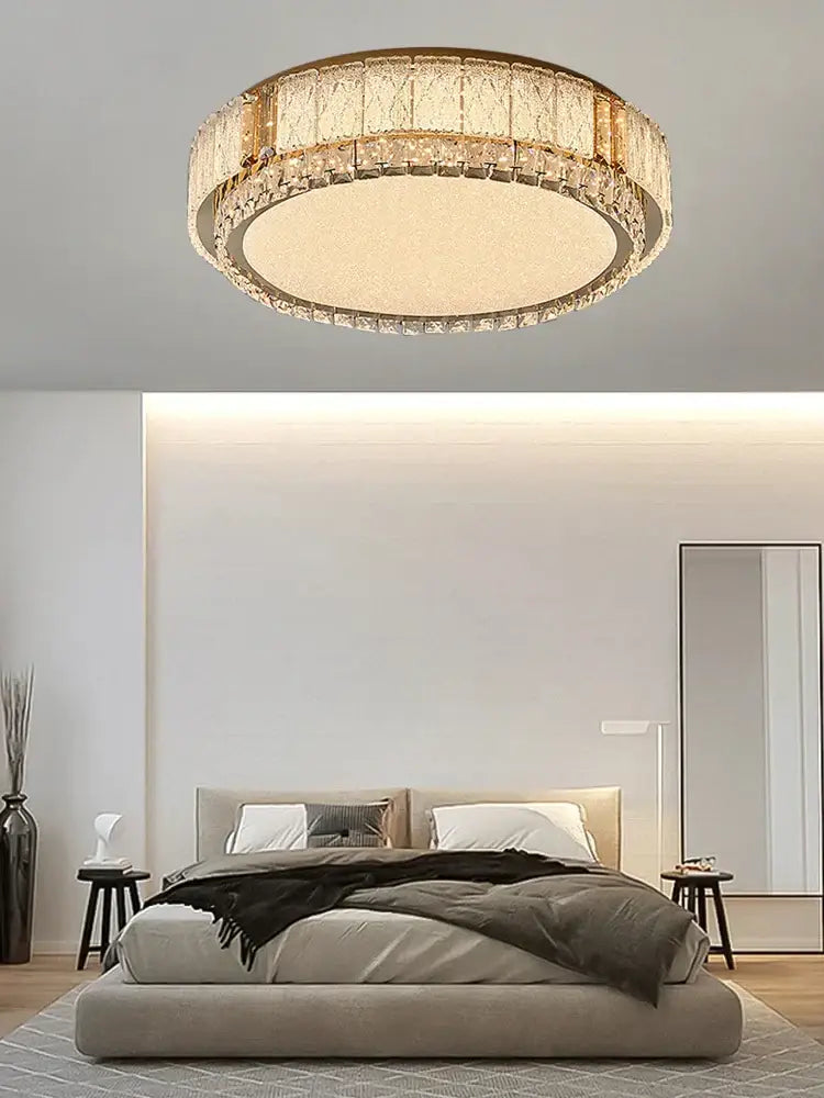 Modern gold crystal glass ceiling light fixture featuring a circular gold-toned metal frame with decorbites crystal glass accents