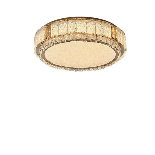 Modern gold-toned light fixture featuring decorbites crystal glass with textured diffuser and crystal glass ceiling accents