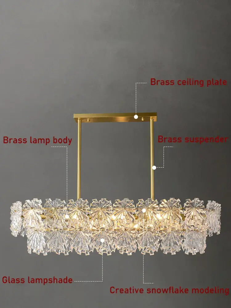 Modern gold crystal glass led pendant dining room chandelier with a gold-toned brass frame and snowflake glass led lampshades