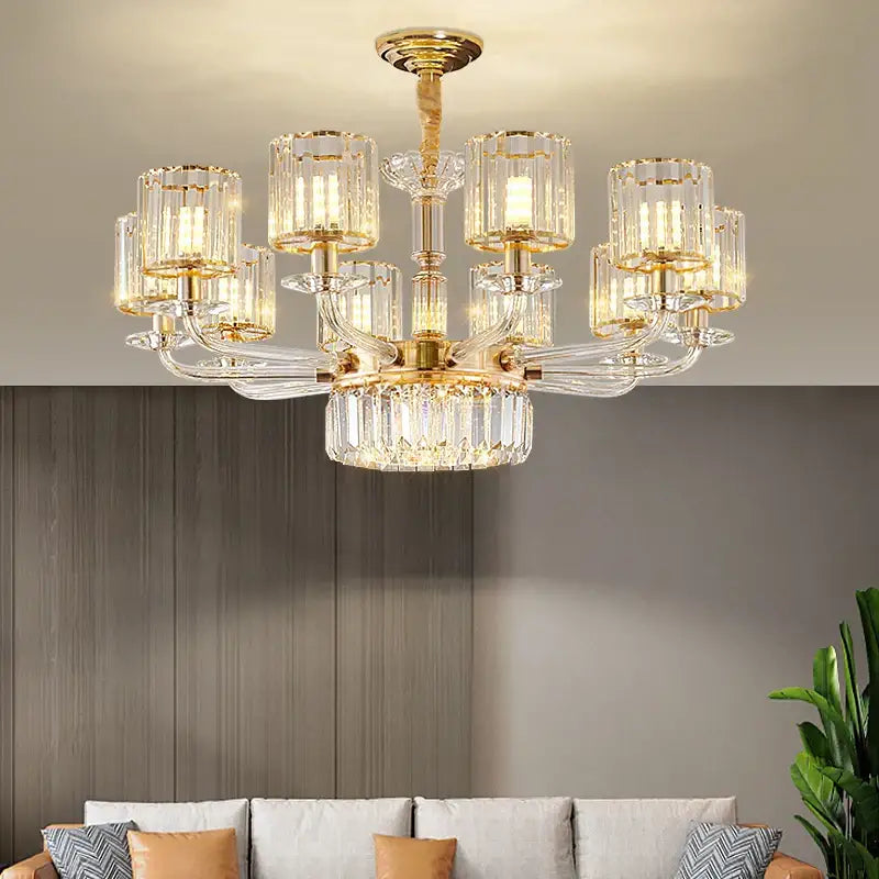 Modern gold pendant lamp with crystal glass cylindrical shades and a crystal-encrusted base for dining room decorbites crystal glass
