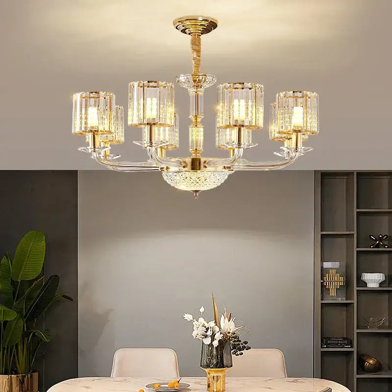 Modern gold crystal glass pendant lamp with clear crystal accents and central decorative bowl for dining room decorbites crystal glass