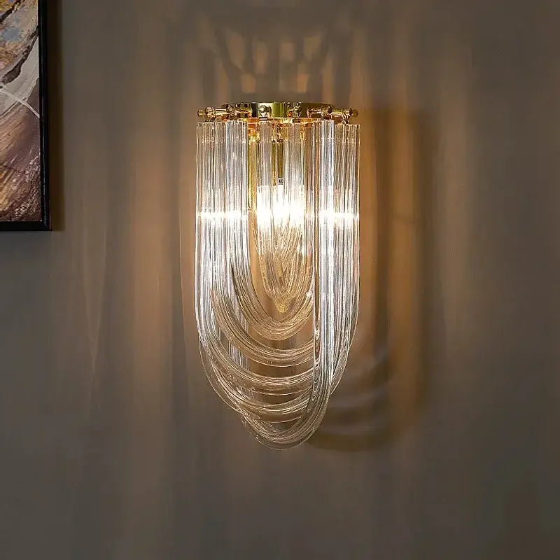 A modern gold crystal glass pendant light wall sconce with cascading clear glass tubes by decorbites crystal glass