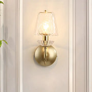 Modern gold crystal glass sconce with textured glass shade and crystal accents for living room wall lighting