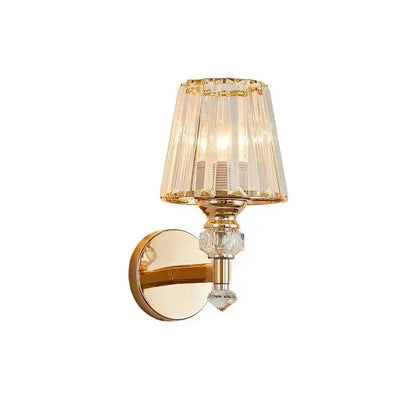 Modern gold wall lamp with decorbites crystal glass faceted shade and dangling clear crystals for luxury bedroom decor