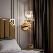 Modern gold crystal glass wall lamp with faceted crystal shade and decorative crystal accents for bedroom decorbites wall lamp