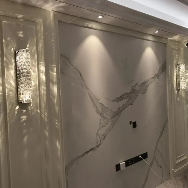 Modern gold crystal glass wall sconce with sleek rectangular design and warm glow light for bedroom decorbites crystal glass wall