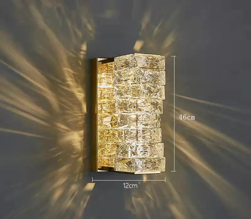 Modern gold crystal glass wall sconce with stacked faceted crystal blocks and warm glow for bedroom decorbites crystal glass wall
