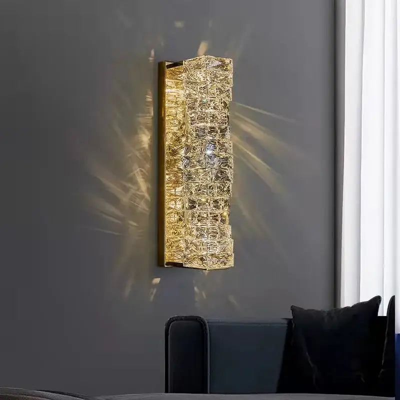 Modern gold wall sconce with decorbites crystal glass textured design for warm bedroom lighting