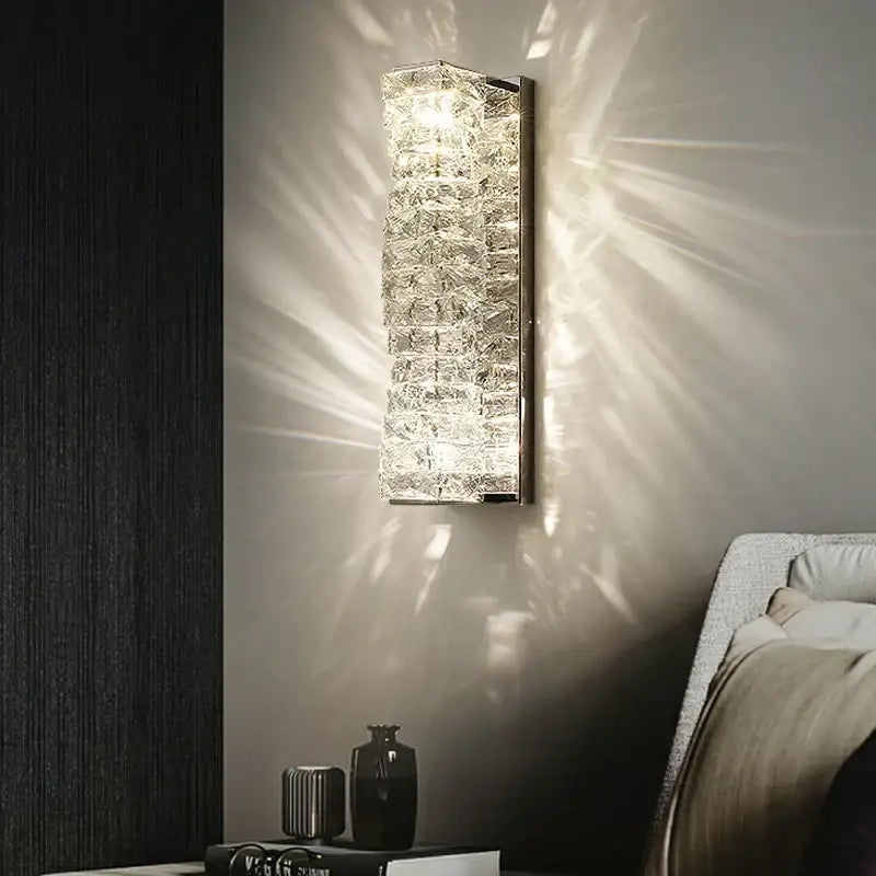 Modern gold crystal glass wall sconce with stacked segments for warm glow light perfect for bedroom decorbites crystal glass