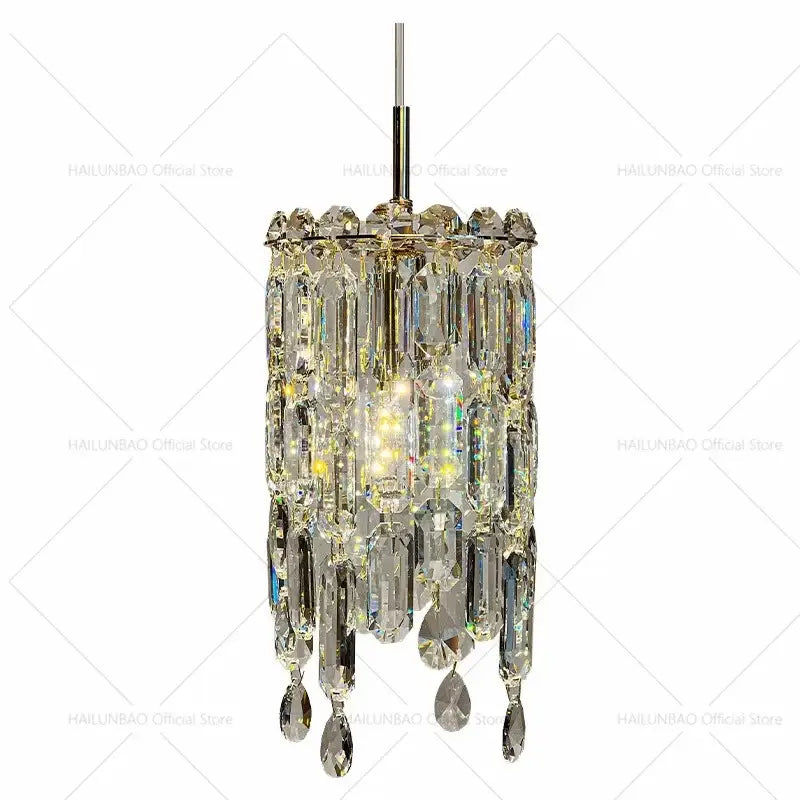 Modern gold decorbites crystal headboard chandelier with cascading faceted prisms and sleek metallic frame for master bedroom
