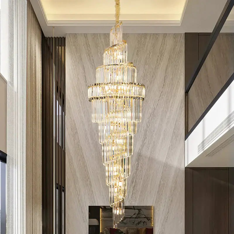 Modern gold crystal hollow chandelier with cascading clear glass prisms and gold-toned accents by decorbites crystal hollow decor