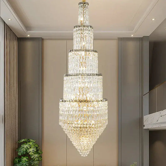 Modern gold crystal hollow long chandelier with tiered conical design and gold-toned metal accents for villa hall lighting