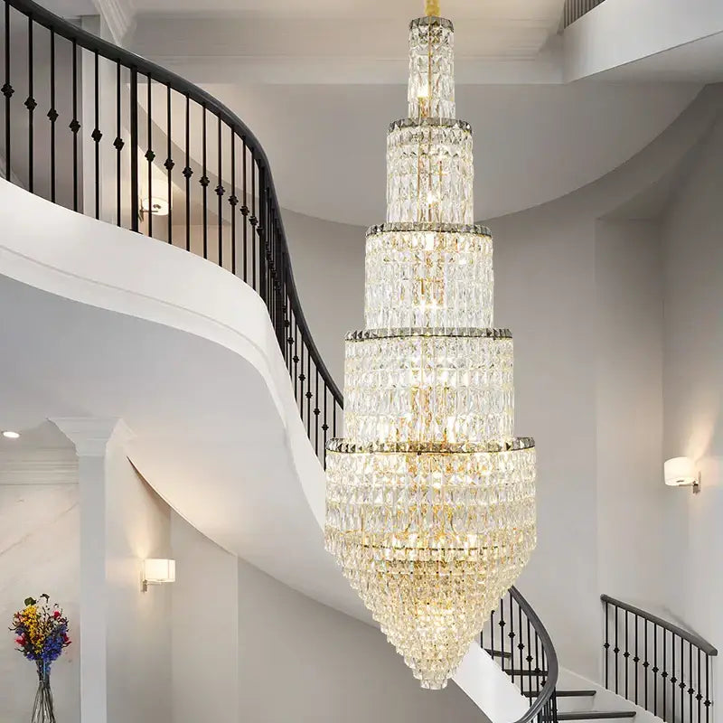 Modern gold crystal hollow long chandelier with cascading faceted crystals and gold-toned frame for villa hall lighting