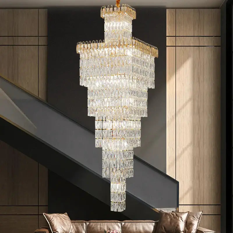 Modern gold crystal hollow stair chandelier featuring multi-tiered gold accents and cascading rectangular prisms decorbites crystal hollow