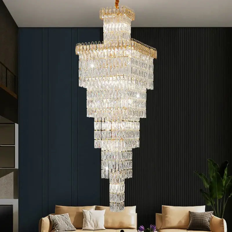 Modern gold crystal hollow stair chandelier with multi-tiered clear faceted crystals and gold-toned metal accents