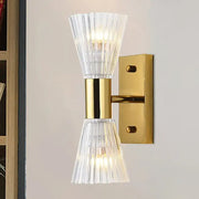 Modern gold crystal hourglass wall light fixture with gold-toned wall light and clear fluted glass shades for bedroom use compatible with 220v-240v and 110v-120v