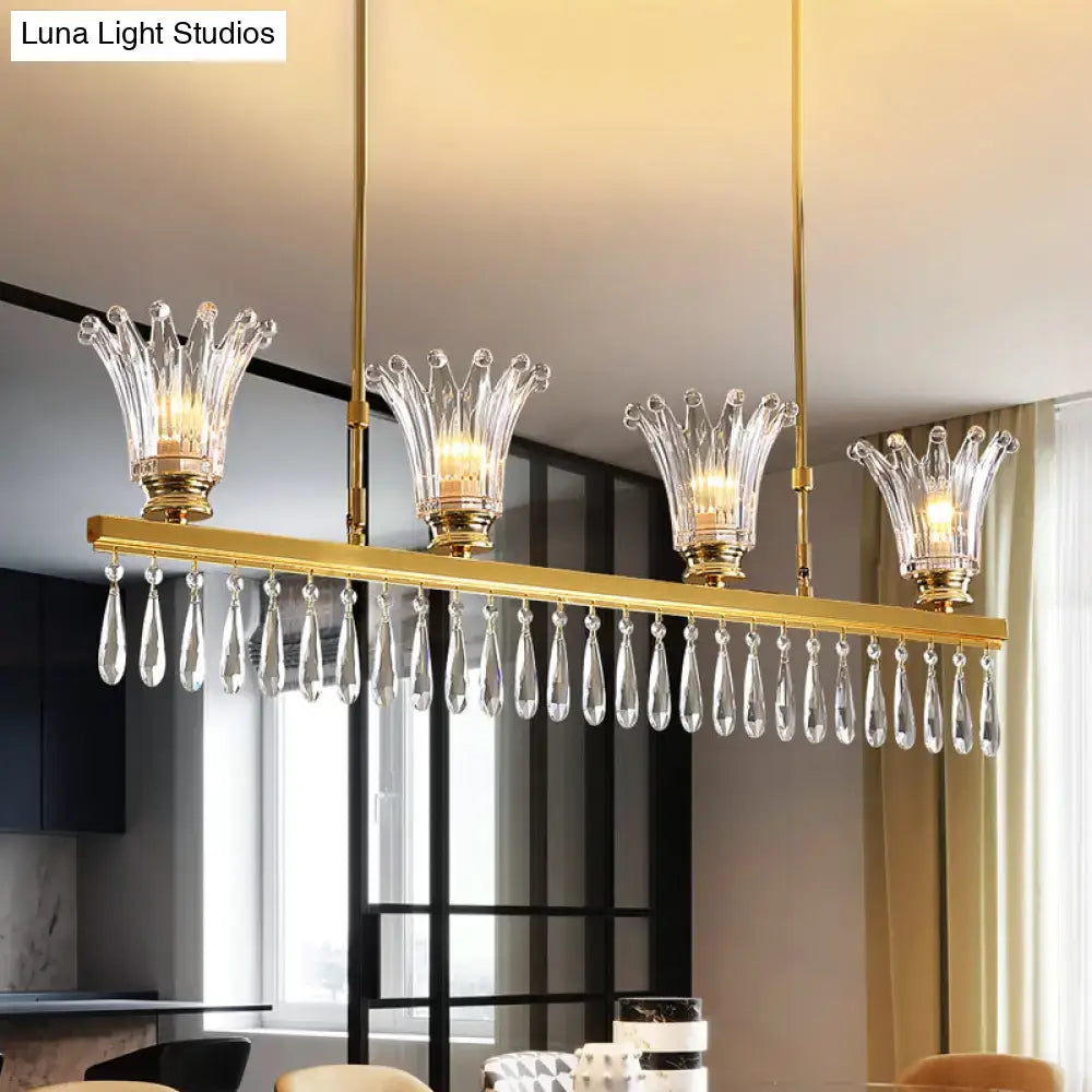 DecorBites™ gold island light ceiling light with four crown-shaped crystal glass shades and dangling teardrop crystals