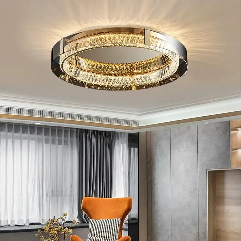 Modern gold crystal led ceiling chandelier featuring a circular metallic frame with faceted crystal rings decorbites crystal led