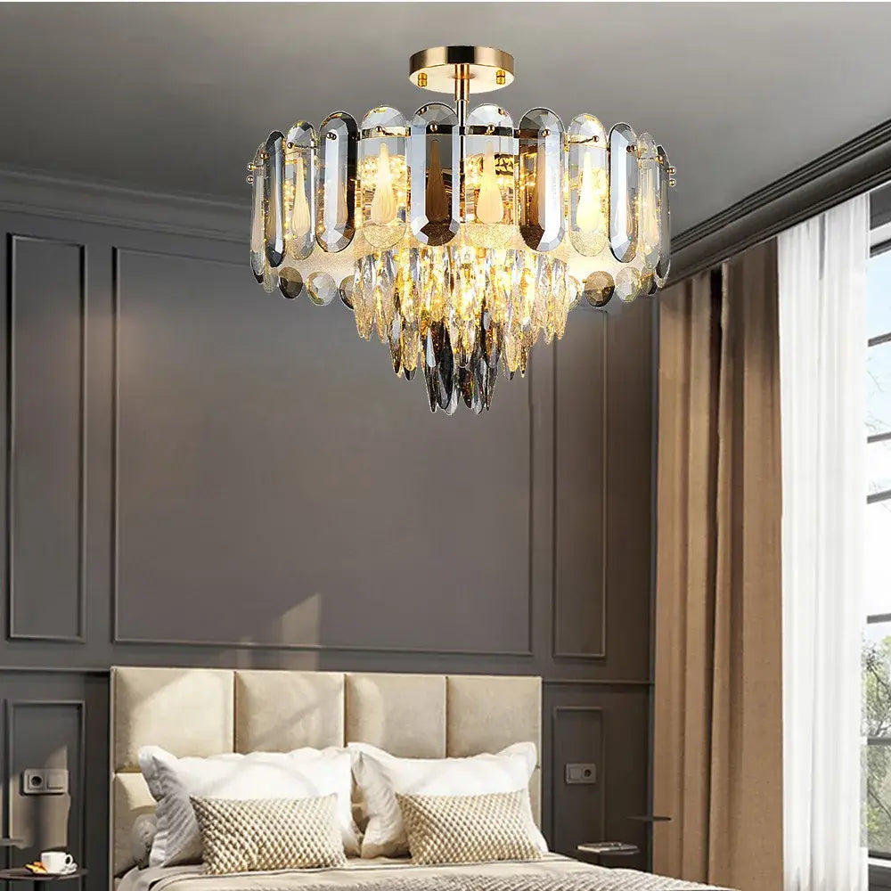 Modern gold crystal led ceiling chandelier with elongated oval glass panels and dangling faceted crystals for dining room decorbites crystal led