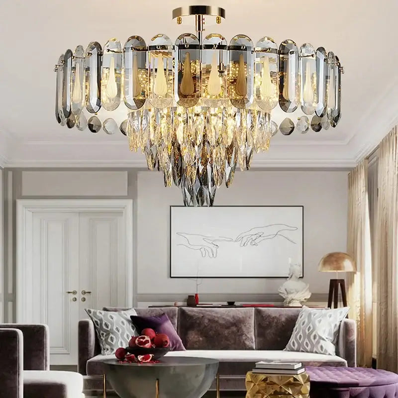 Modern gold crystal led ceiling chandelier with cascading clear and amber teardrop pendants for dining room decorbites crystal led