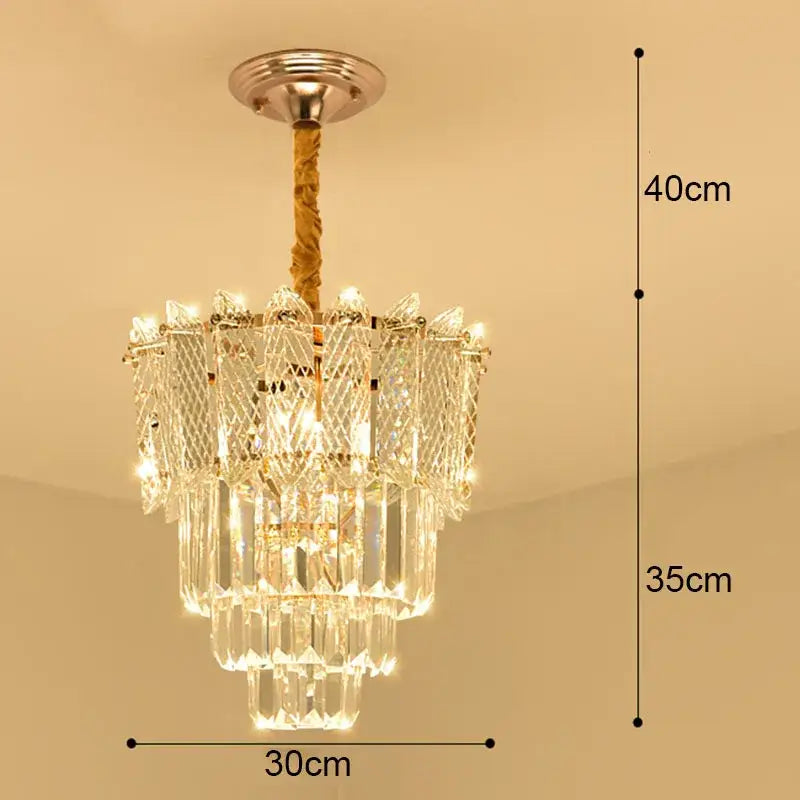 Modern gold crystal led ceiling chandelier with tiered clear glass prisms and braided cord for dining room decorbites crystal led