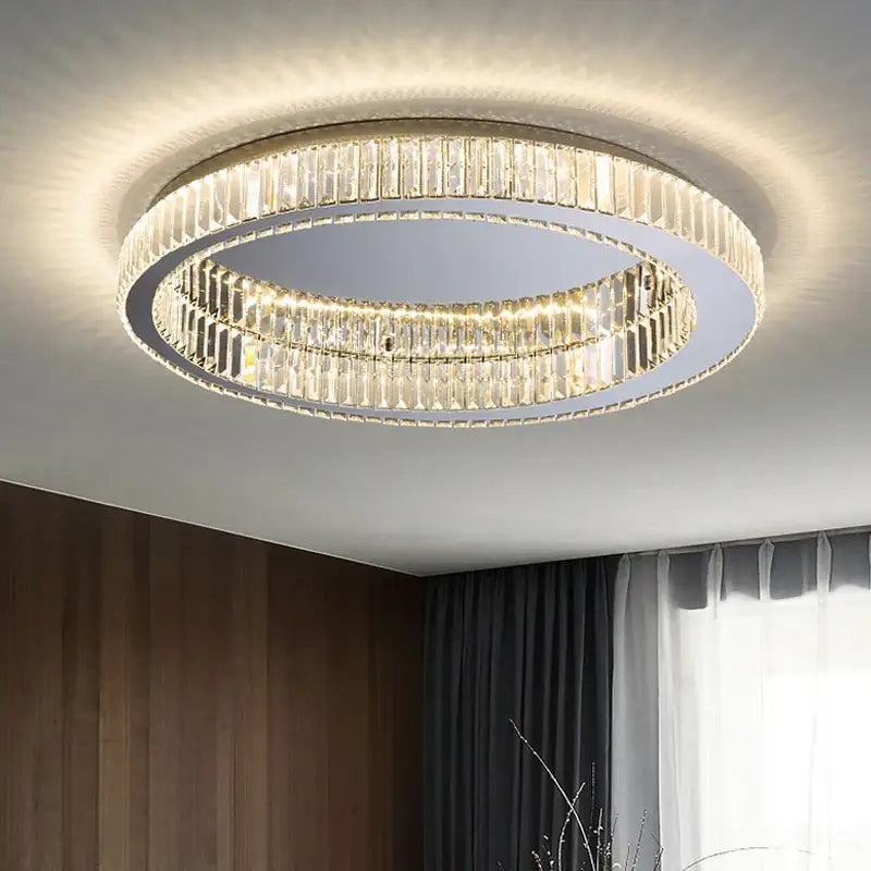 Modern gold crystal led ceiling chandelier with two concentric rings of faceted crystals in a sleek metallic frame