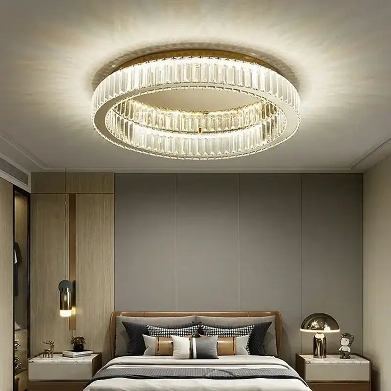 Modern gold crystal led ceiling chandelier with two concentric rings of faceted crystals in polished gold frame
