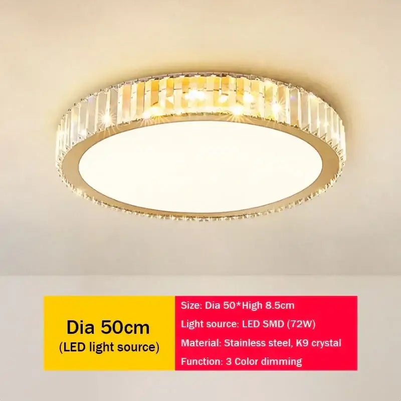 Modern gold crystal led ceiling light with gold stainless steel frame and clear k9 crystals emitting warm white glow