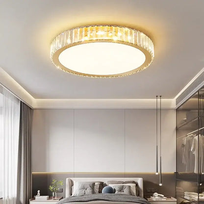 Modern gold crystal led ceiling light with faceted crystal ring and illuminated center for bedroom decorbites crystal led