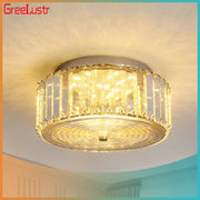 Modern gold crystal led ceiling light by greelustr with clear crystal bars and warm yellow illumination for dining room
