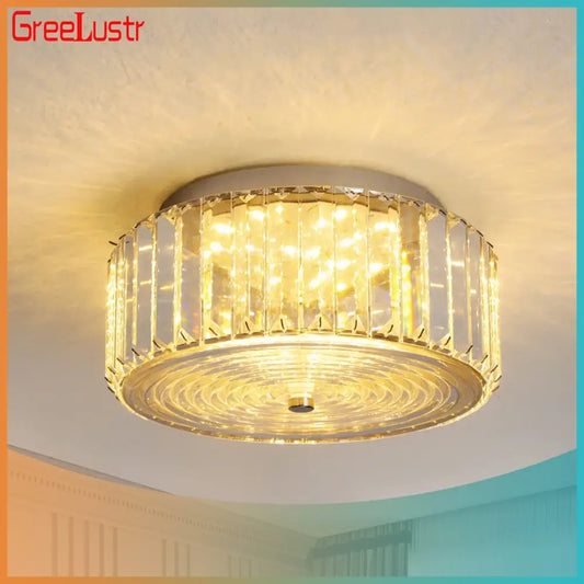 Modern gold crystal led ceiling light by greelustr with clear crystal bars and warm yellow illumination for dining room