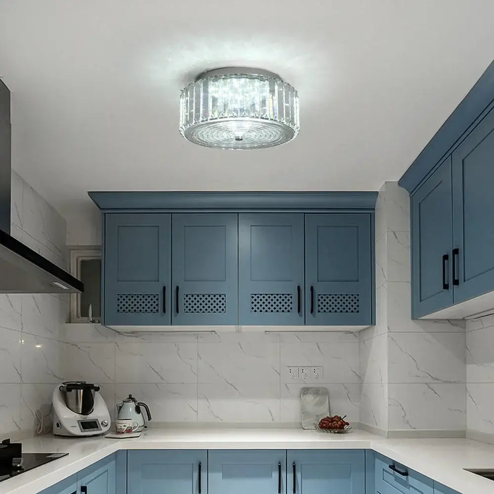 Modern gold crystal led ceiling light with clear faceted crystal design and metallic base for dining room chandelier