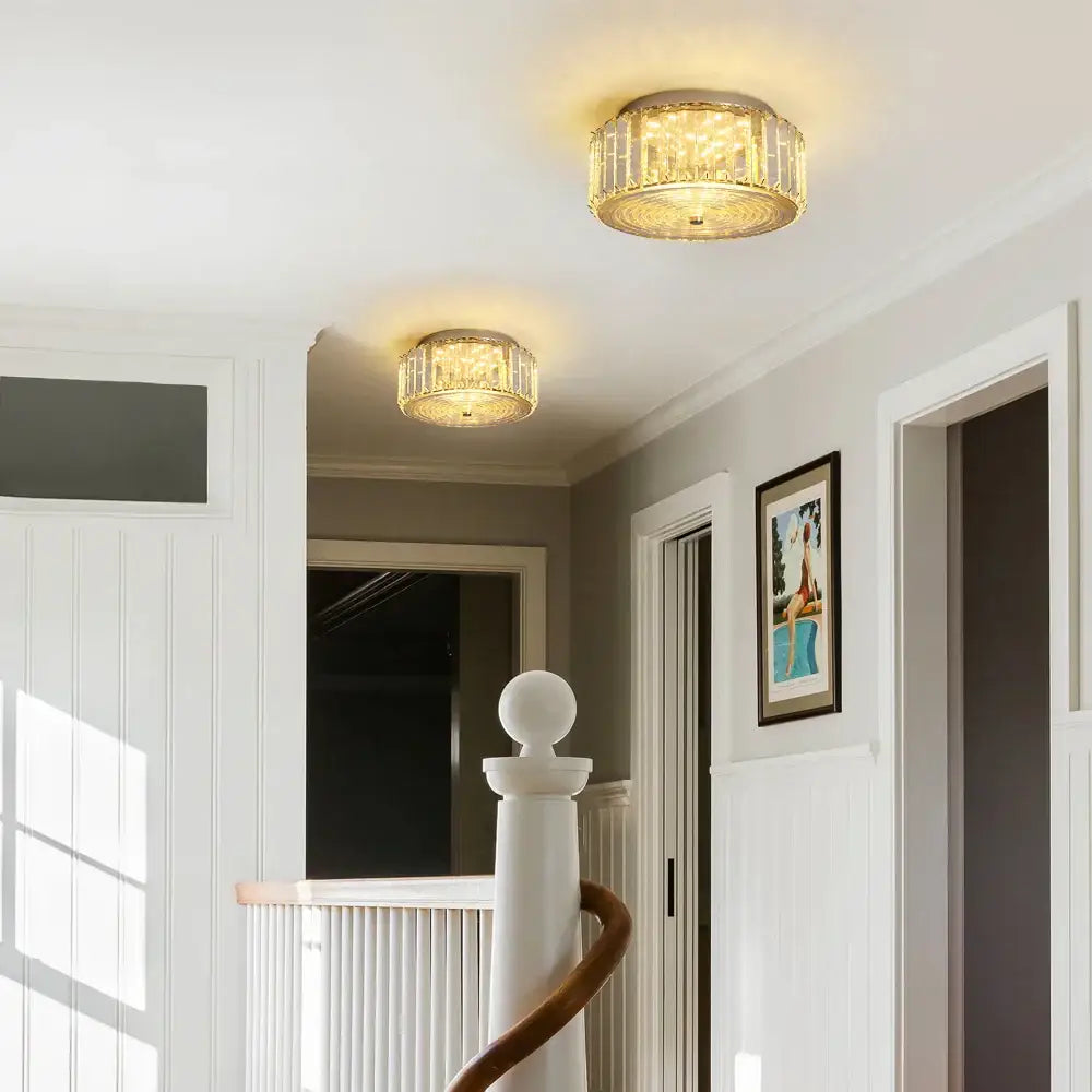 Modern gold crystal led ceiling light with circular design and faceted glass elements for dining room chandelier
