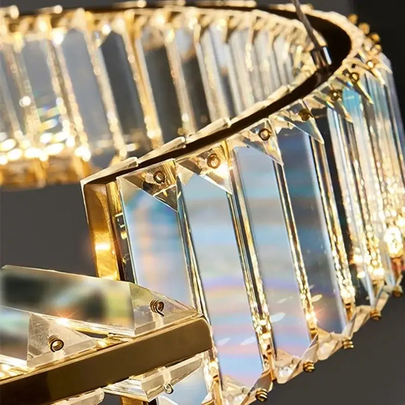 Modern gold crystal led chandelier with long faceted prisms for elegant dining room decorbites crystal led lighting
