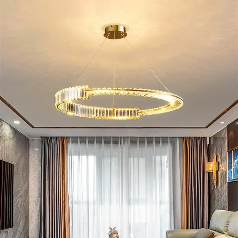 Modern gold crystal led chandelier with clear crystal accents and circular design for dining room ceiling decorbites crystal led