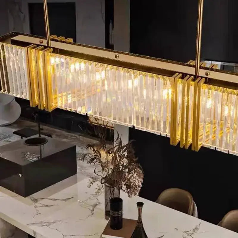 Modern gold crystal led chandelier with vertical crystal rods and warm lights for dining room by decorbites crystal led