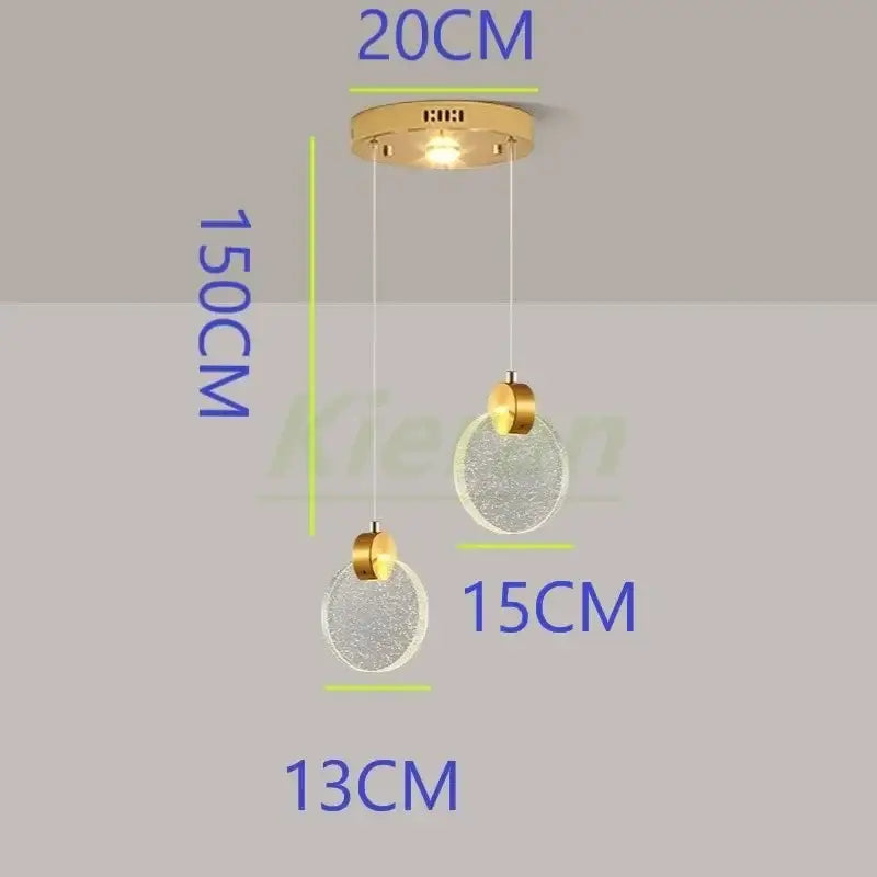 Modern gold crystal led chandelier with two textured glass spheres hanging at different heights for dining room decorbites crystal led