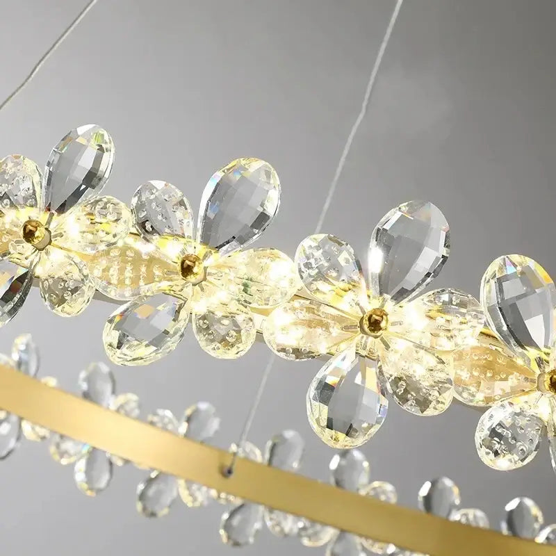 Modern gold crystal led chandelier with faceted crystal flowers and warm led lights for dining room decorbites lighting