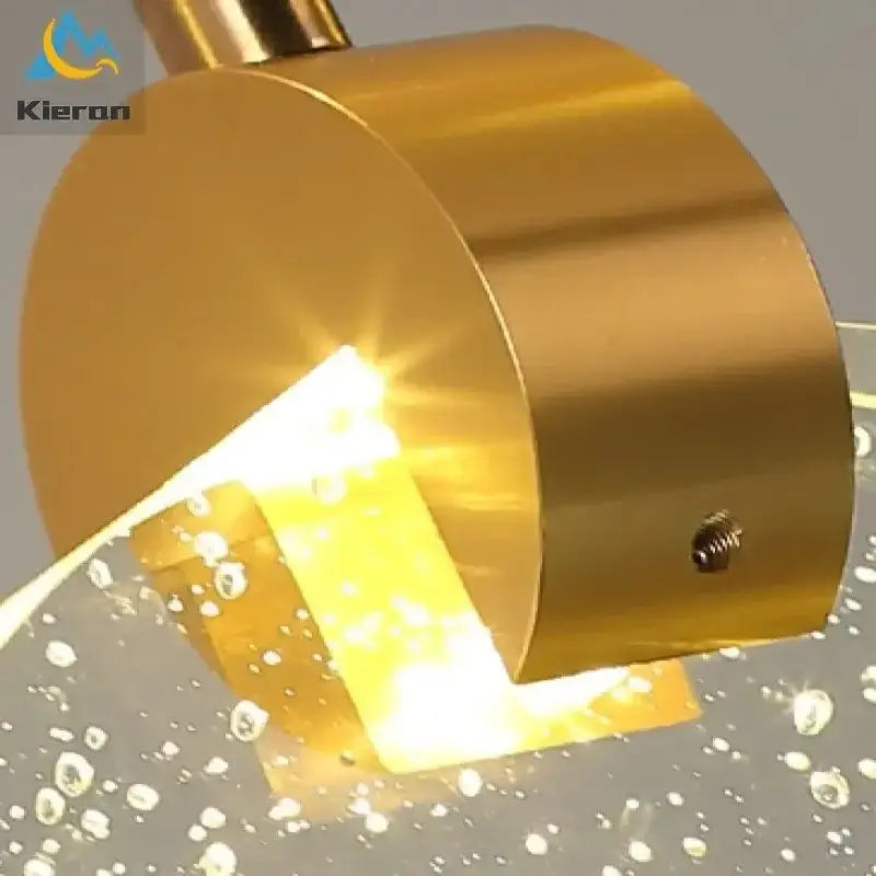 Modern gold crystal led chandelier dining room pendant light with golden brass cylindrical fixture and integrated led lighting decorbites crystal led