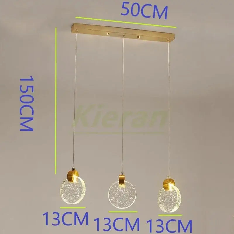 Modern gold crystal led chandelier featuring three spherical crackled glass globes suspended from a brass fixture
