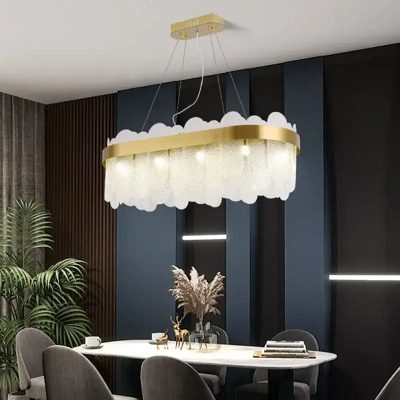 Modern gold crystal led chandelier with frosted glass petals and cloud-shaped design by decorbites crystal led decor