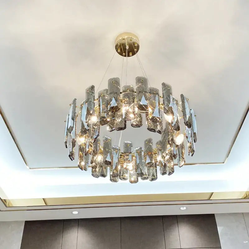 Modern gold crystal led chandelier with cascading faceted crystals for elegant living room decorbites crystal led light