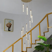 Modern gold crystal led chandelier with vertical crystal rods suspended from circular ceiling mount for living room decorbites crystal led