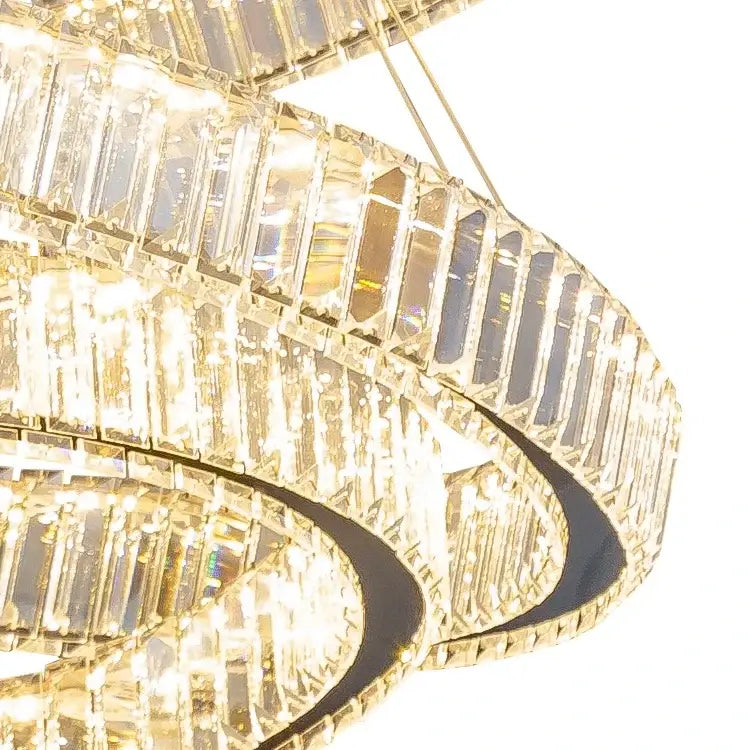 Modern gold crystal led chandelier rings featuring cascading faceted prisms in a sleek frame for villa staircase decorbites crystal led