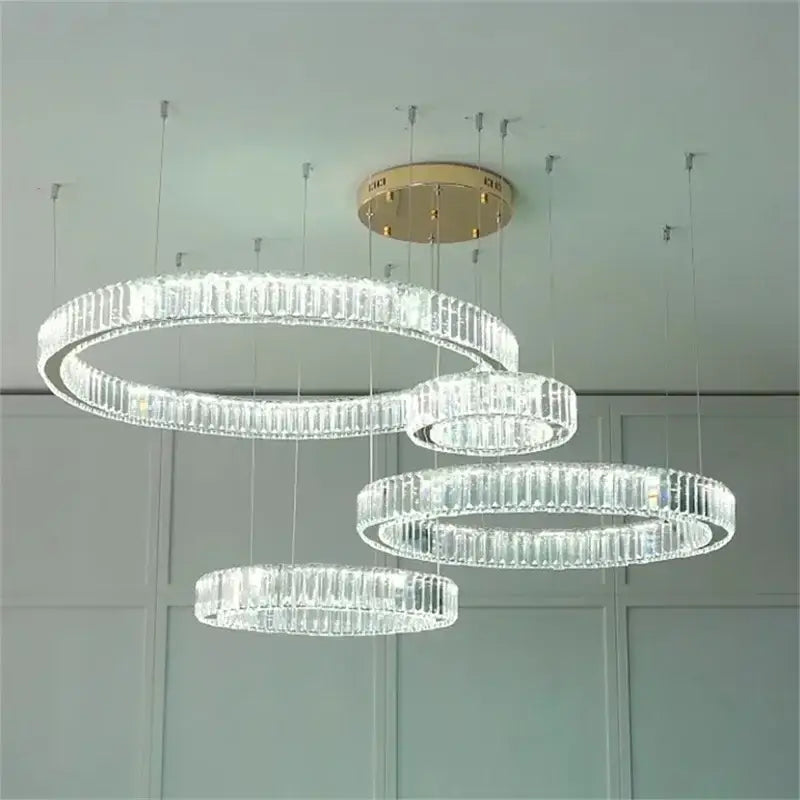 Modern gold crystal led chandelier rings featuring tiered concentric crystal rings for villa staircase decorbites crystal led