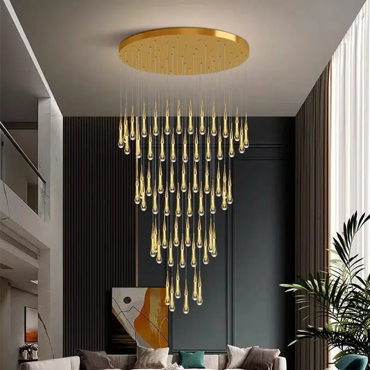 Modern gold crystal led chandelier with cascading teardrop glass pendants for dining room decorbites crystal led lighting